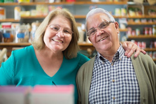 Happy senior couple smiling together inside a store in Portugal.
